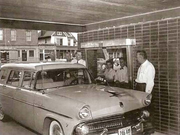 car pulled up to the drive-up banking in 1950s